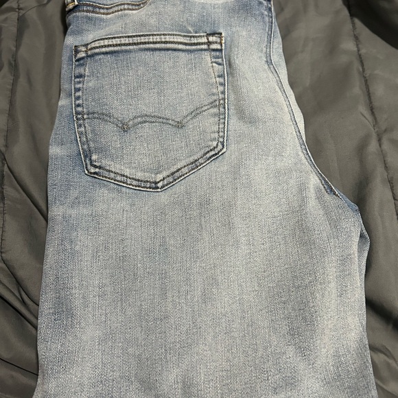 Distressed Blue Jeans - Picture 2 of 3